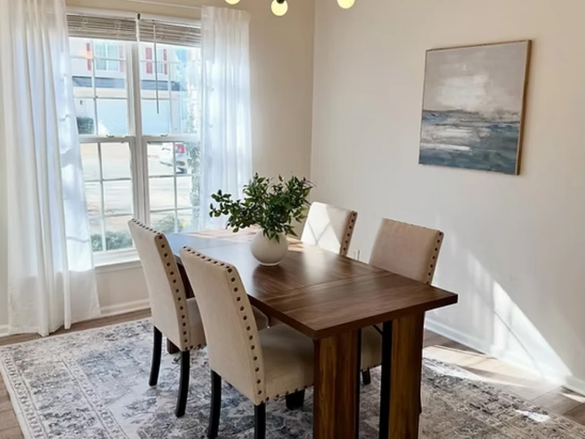 Elegant dining setup with beige chairs