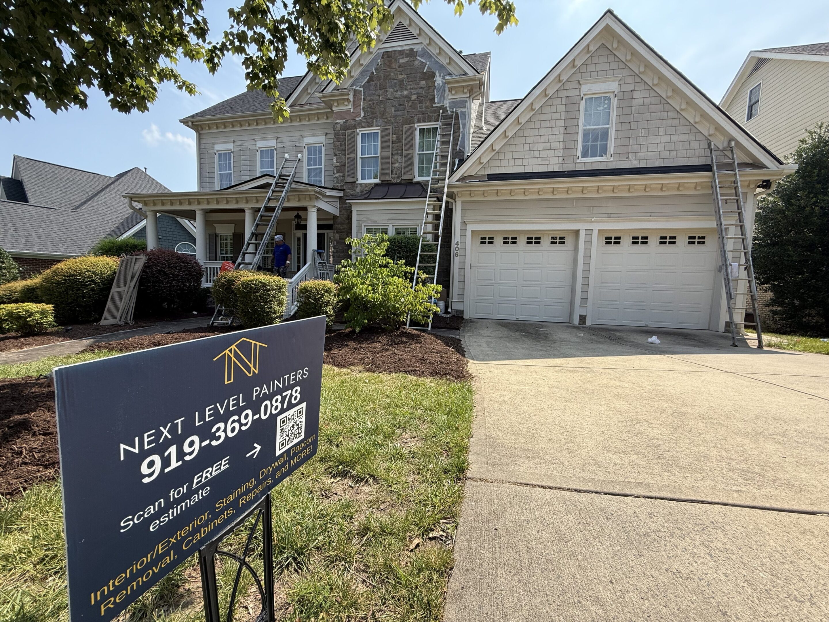 For sale: Beautiful two-story house with a double garage and spacious driveway.